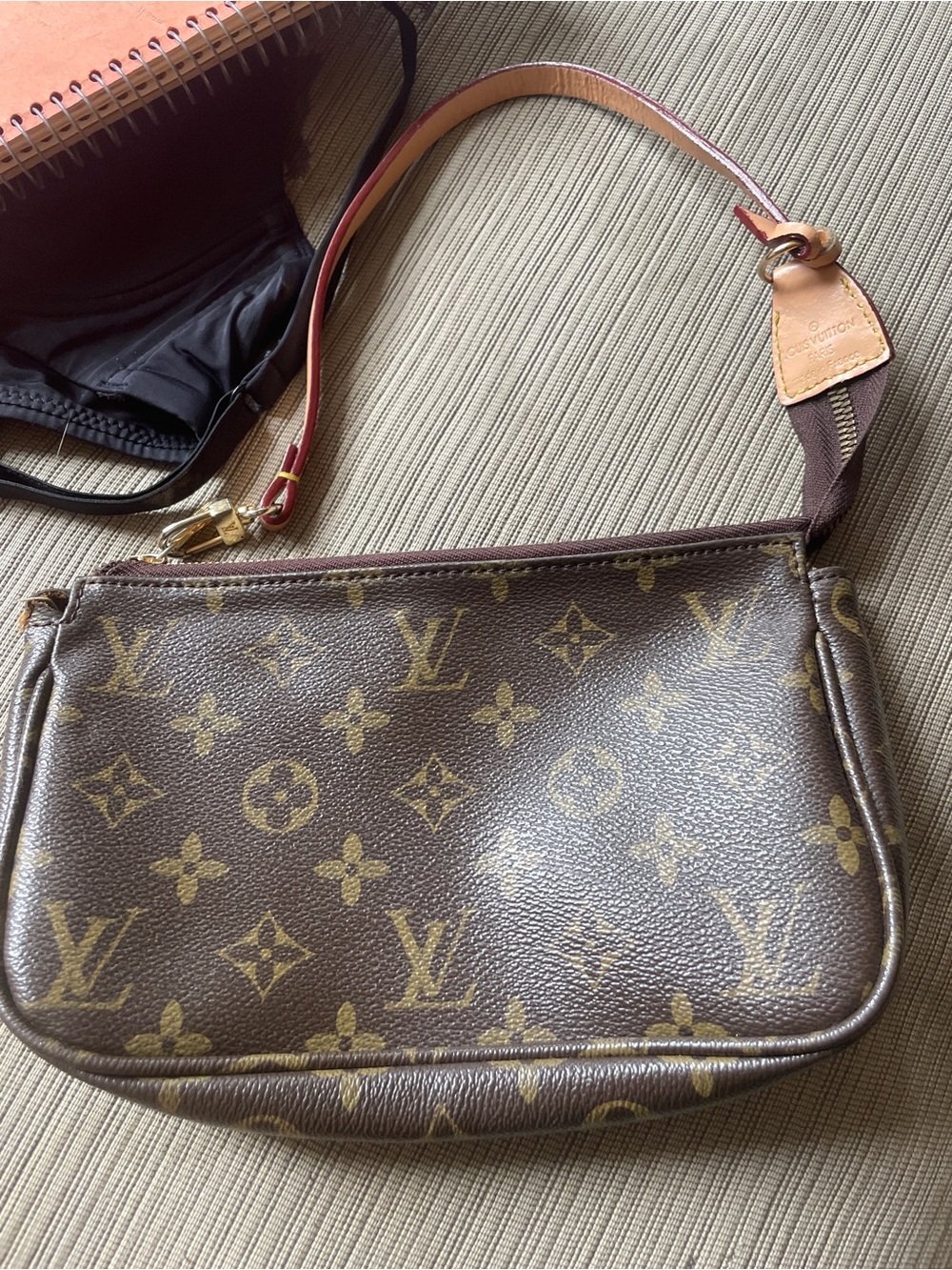 Louis Vuitton Monogram Canvas Clutch with Vachetta Strap